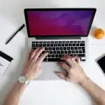 person using laptop computer