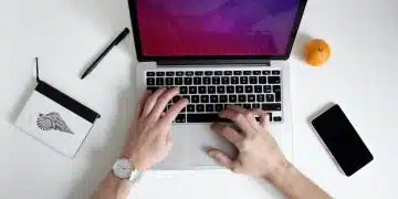 person using laptop computer