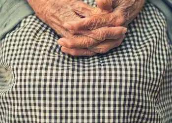 person's hand in shallow focus